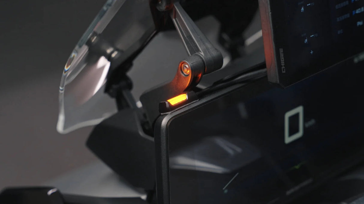 Chigee SR-1 radar system for blind spot detection, showing device mounted on vehicle with radar sensors and display screen.