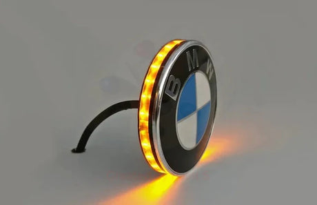 ApexMoto BMW emblem LED turn signal set with 74mm lights, including options for daytime running lights, on a vehicle.