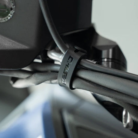 Chigee silicone cable management set with straps for organizing and securing computer and electronic cables.