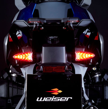 Weiser WeiserCAN EXT-CAN LED multifunction flashing light with plug-and-play installation, shown in a close-up on the product.