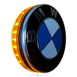 ApexMoto BMW LED emblem turn signal set with 68mm lights, featuring optional daytime running lights, installed on a vehicle.