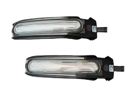 Blue ApexMoto daytime running light and turn signal for 1300GS handlebar covers, motorcycle lighting with LED indicators.