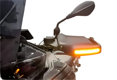 Blue ApexMoto daytime running and turn signal lights for handguards on BMW 1300GS motorcycle.