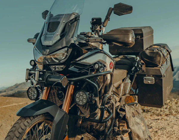 Denali CANsmart Gen 2 device for Honda Africa Twin 1100 motorcycle, used for electronic control and accessories management.