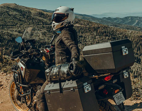 Denali CANsmart Gen 2 for Honda Africa Twin 1100 motorcycle, smart CAN bus controller, black device with wiring connectors.