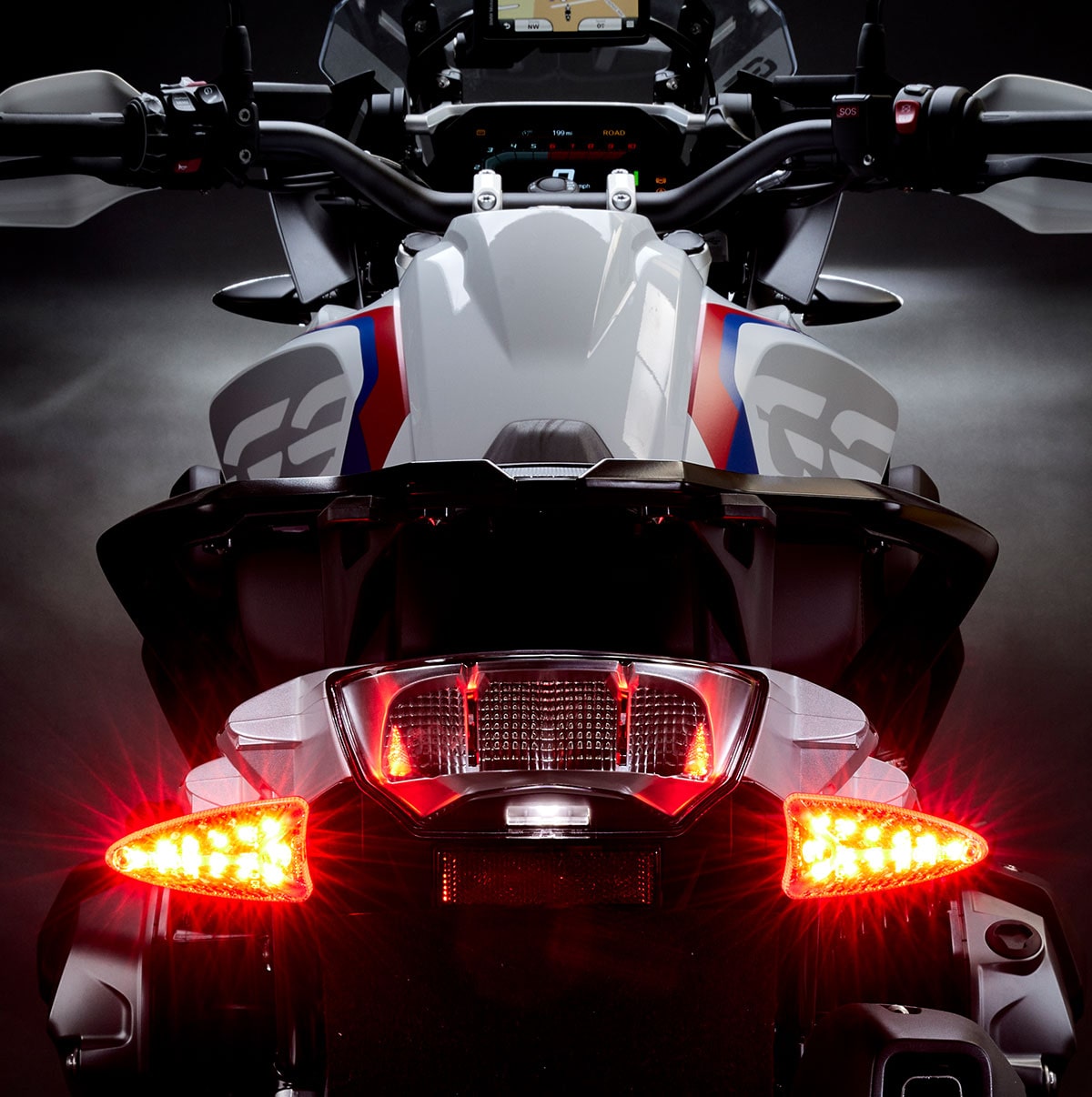 Weiser LED multifunctional turn signal light with plug-and-play installation, shown from rear angle on extreme-evo special vehicle.