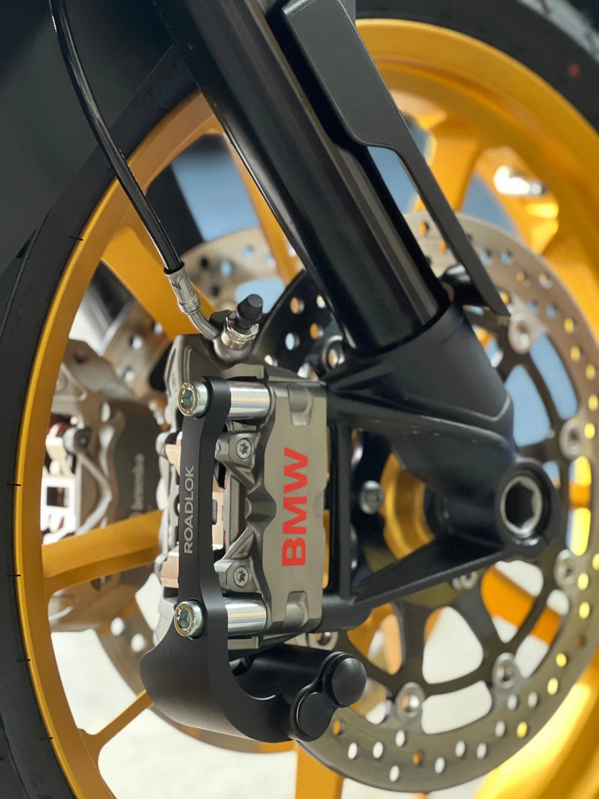 Roadlok XRA Eurosport ART4 100mm disc lock on BMW R1300GS, R1250GS, and 1200 LC motorcycle brake disc in black